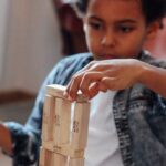 Creative Blocks - Boy Holding Jenga Block
