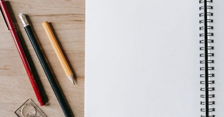 Classroom Design - Pencils and rulers near notebook on table