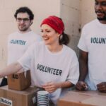Volunteering Abroad - Three People Donating Goods